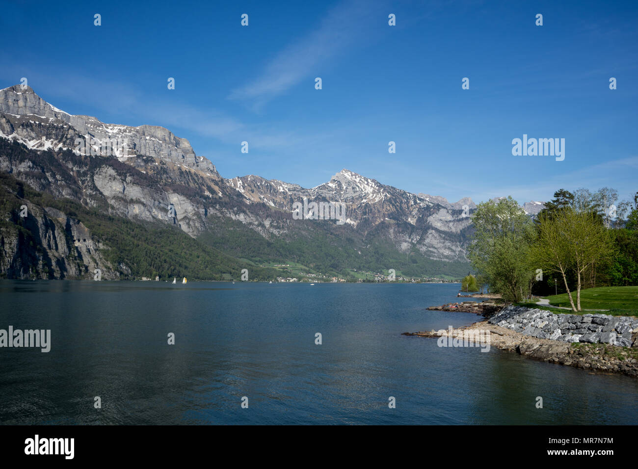 Walensee Background Swiss village on ice cold Walensee lake with mountains in background ...