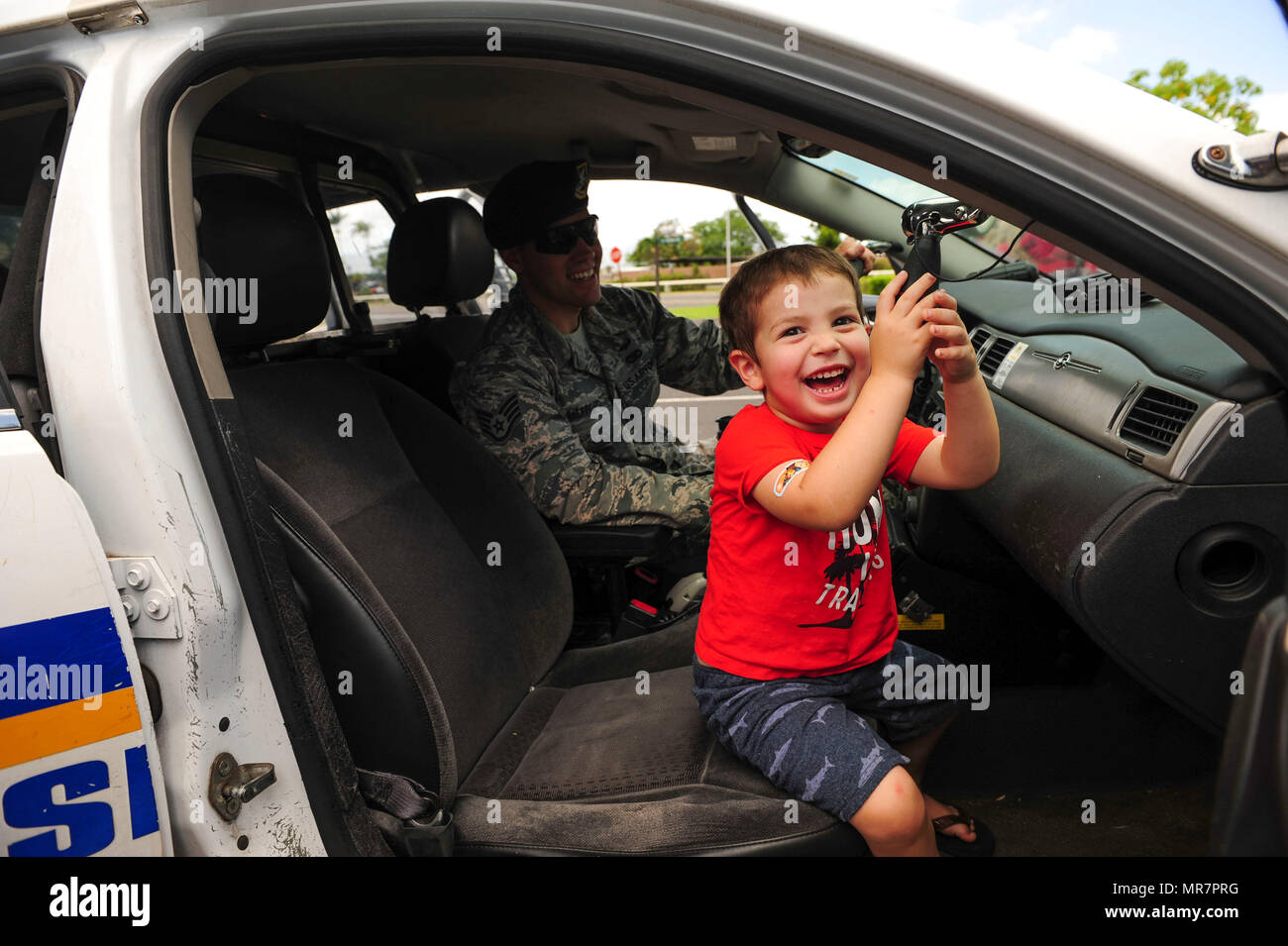 Police Riot Car Children Inaction A young child sits in a police car during the Police Week public ...