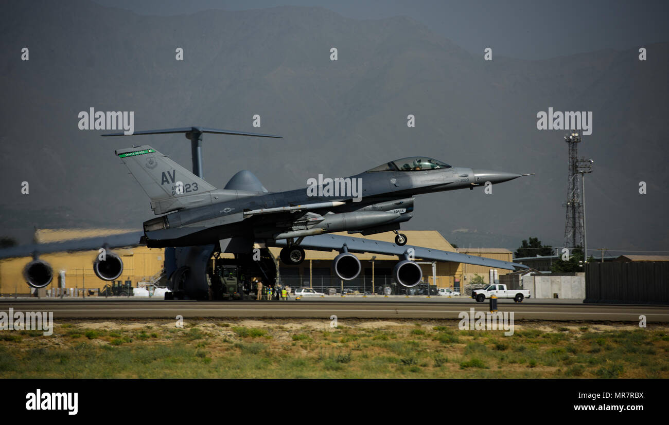 An F-16 Fighting Falcon, piloted by Brig. Gen. Jim Sears, takes off from Bagram Airfield, Afghanistan, May 22, 2017. Sears has served as the commander of the 455th Air Expeditionary Wing for the last 12 months and will soon depart Afghanistan to continue his Air Force career. During the flight, Sears patrolled the skies with his wingman, engaging enemy ground forces from above to support coalition and Afghan troops. (U.S. Air Force photo by Staff Sgt. Benjamin Gonsier) Stock Photo