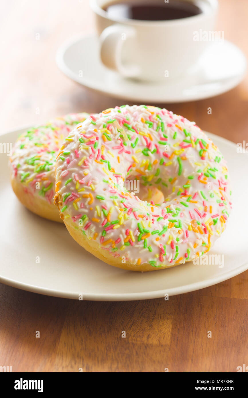 Sweet glazed donuts sprinkles hi-res stock photography and images - Alamy
