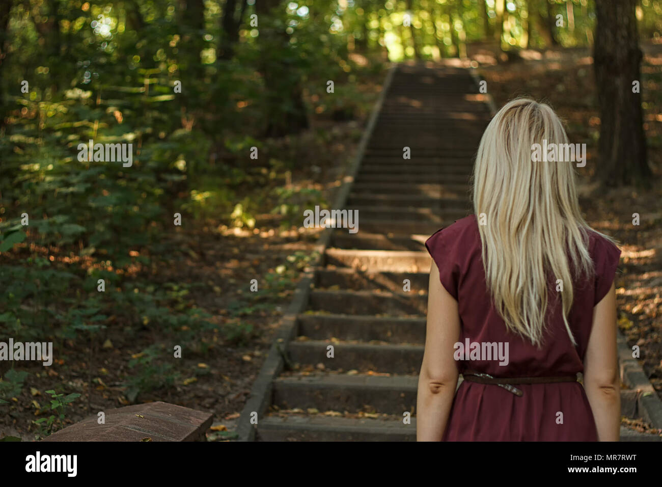 Woman down stairs back view hi-res stock photography and images - Alamy