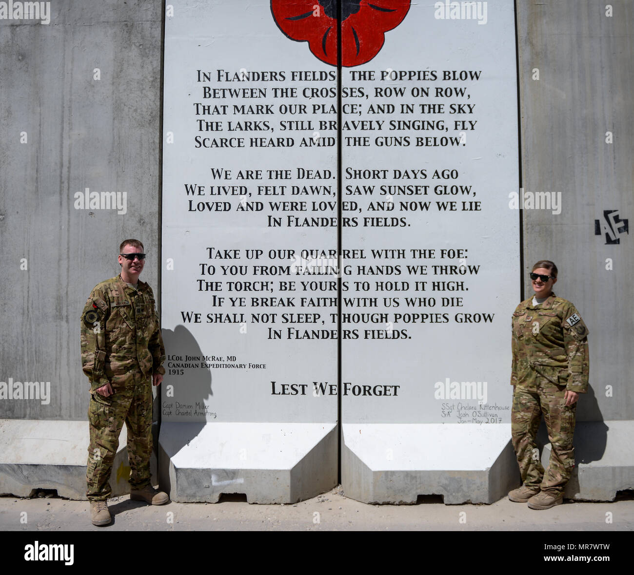 A plaque with 'In Flanders Fields poem by Lt Col John McCrae, National  Memorial Arboretum, Alrewas, UK Stock Photo - Alamy