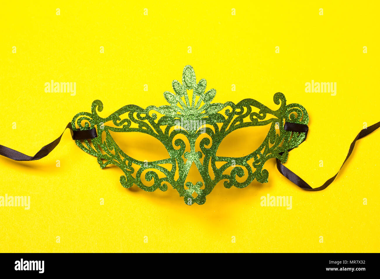 Download Green Mardi Gras Mask On A Bright Yellow Background Stock Photo Alamy PSD Mockup Templates