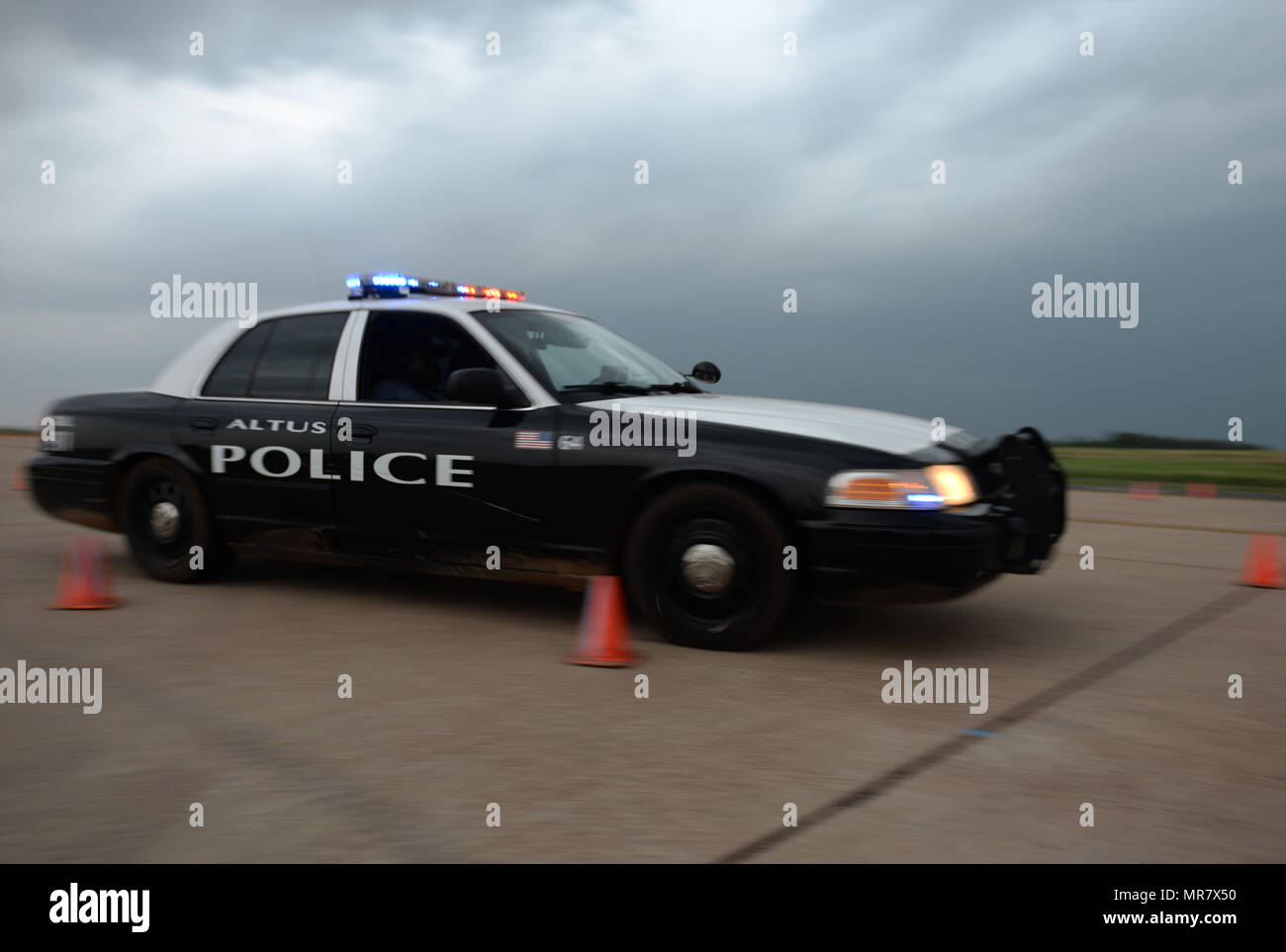 An Altus Police Department Officer takes off at high speeds during the