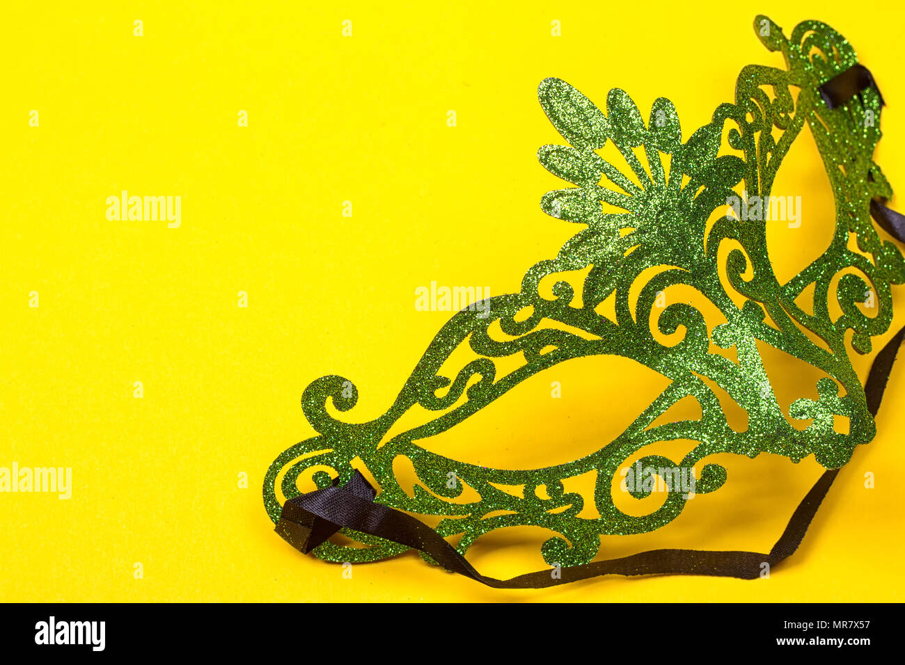 Download Green Mardi Gras Mask On A Bright Yellow Background Stock Photo Alamy PSD Mockup Templates