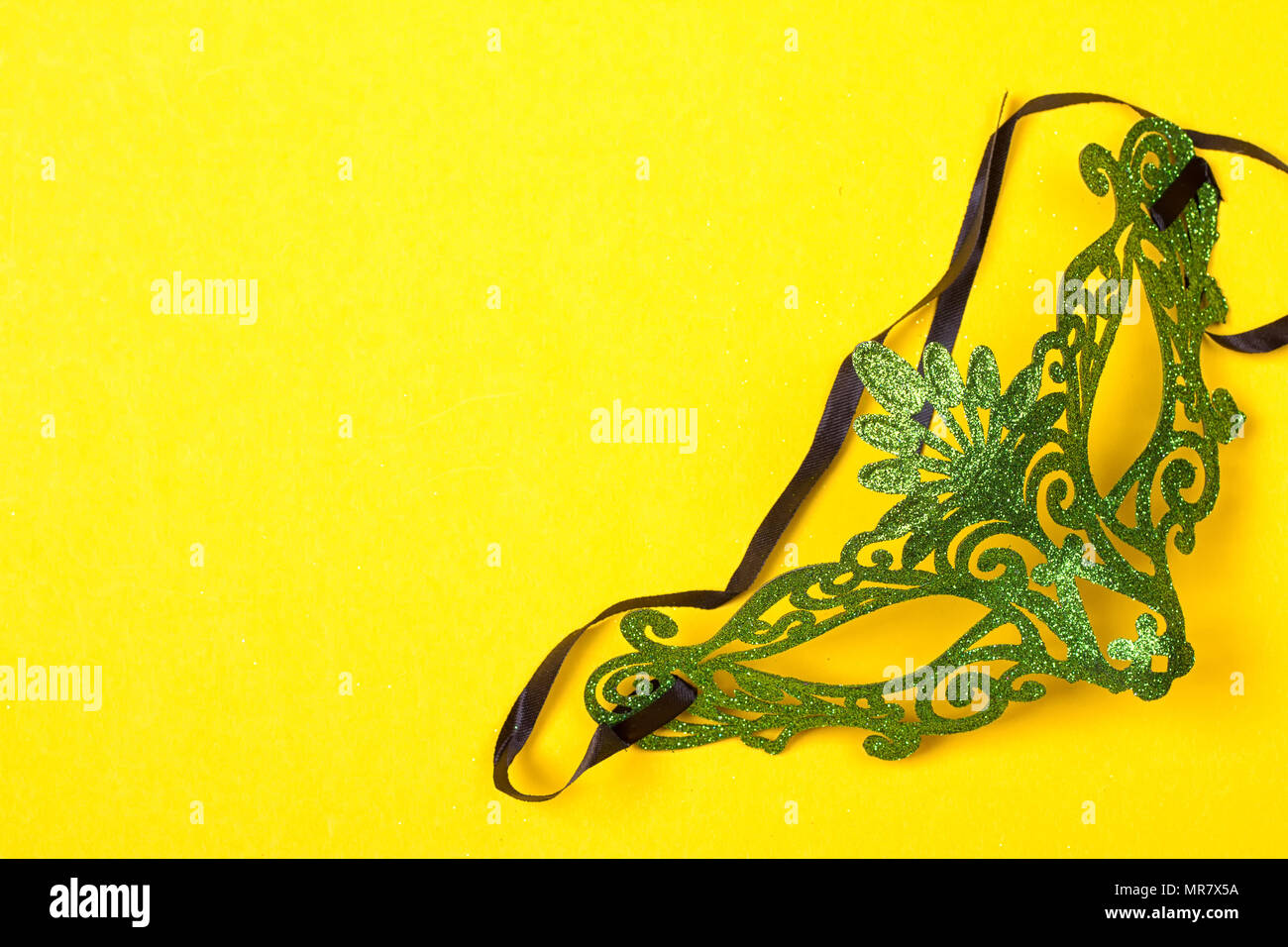 Download Green Mardi Gras Mask On A Bright Yellow Background Stock Photo Alamy PSD Mockup Templates