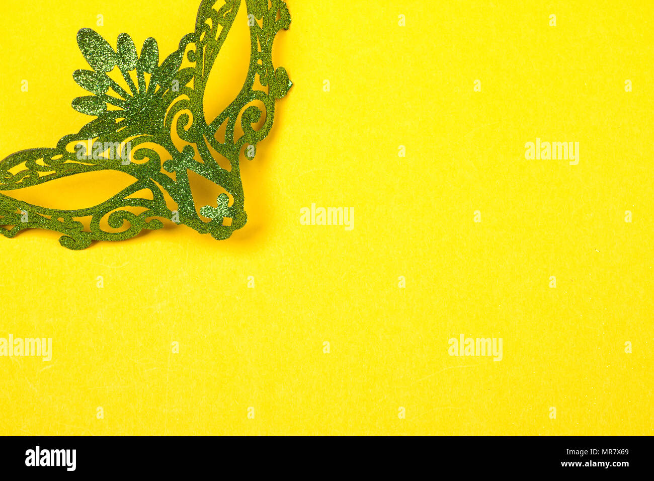 Download Green Mardi Gras Mask On A Bright Yellow Background Stock Photo Alamy Yellowimages Mockups