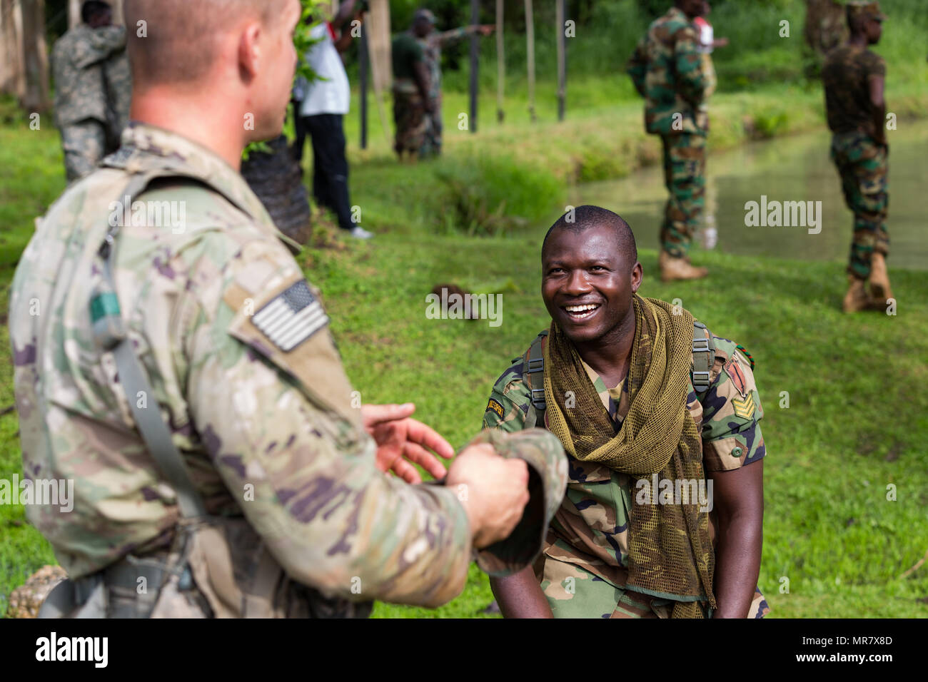 Ghanaian Armed Forces Sgt. M Agyemang discuss techniques for climbing rope  with U.S. Soldiers from the 1st Battalion, 506th Infantry Regiment, 1st  Brigade Combat Team, 101st Airborne Division during United Accord 2017