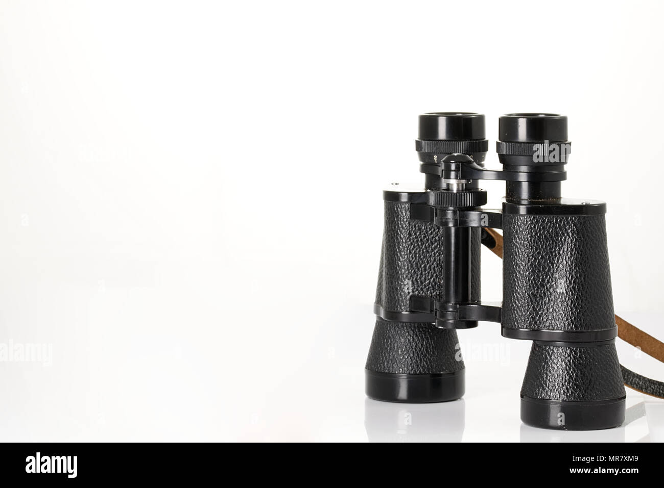 Retro binoculars (field glasses) isolated on a white background Stock