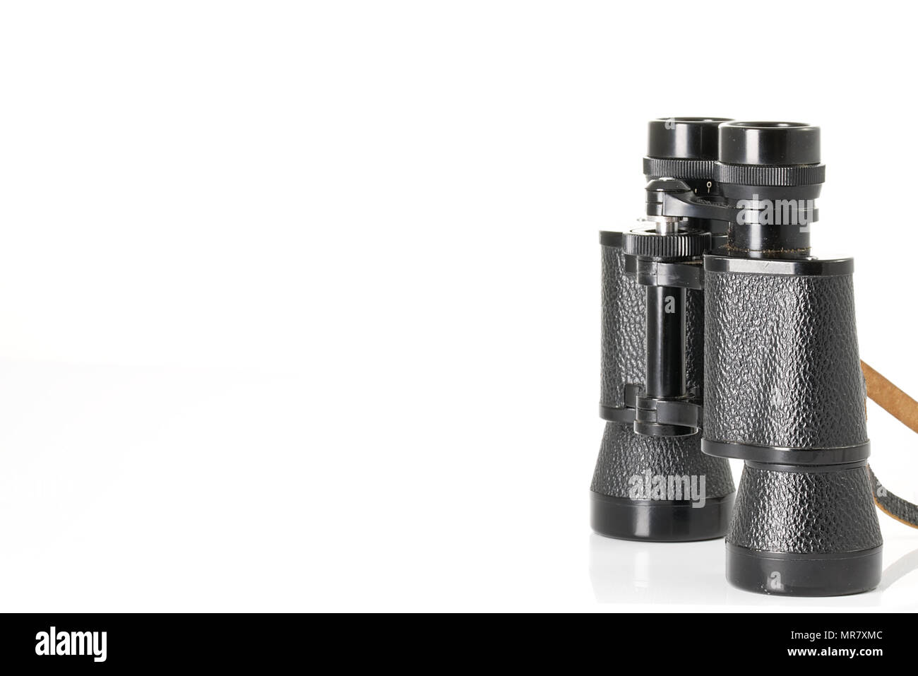 Retro binoculars (field glasses) isolated on a white background Stock