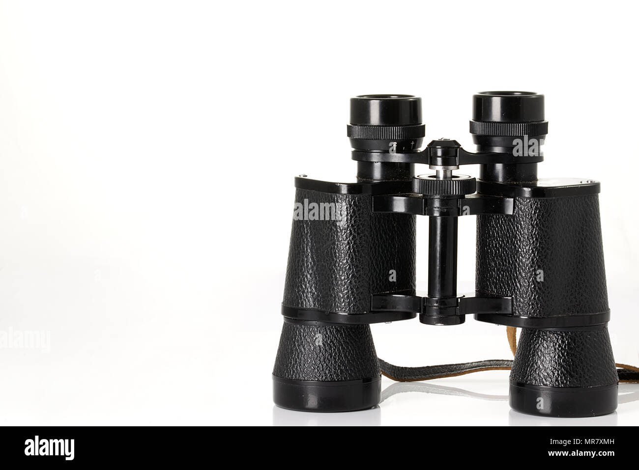 Retro binoculars (field glasses) isolated on a white background. Stock Photo