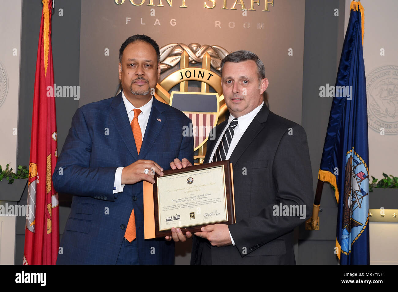 Dr. Charles Brandon (Left), director of the Office of Business