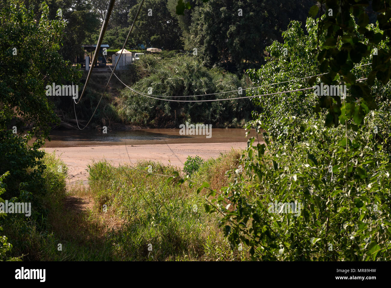 The Pont Drift Cable Car Crossing the Limpopo River Stock Photo