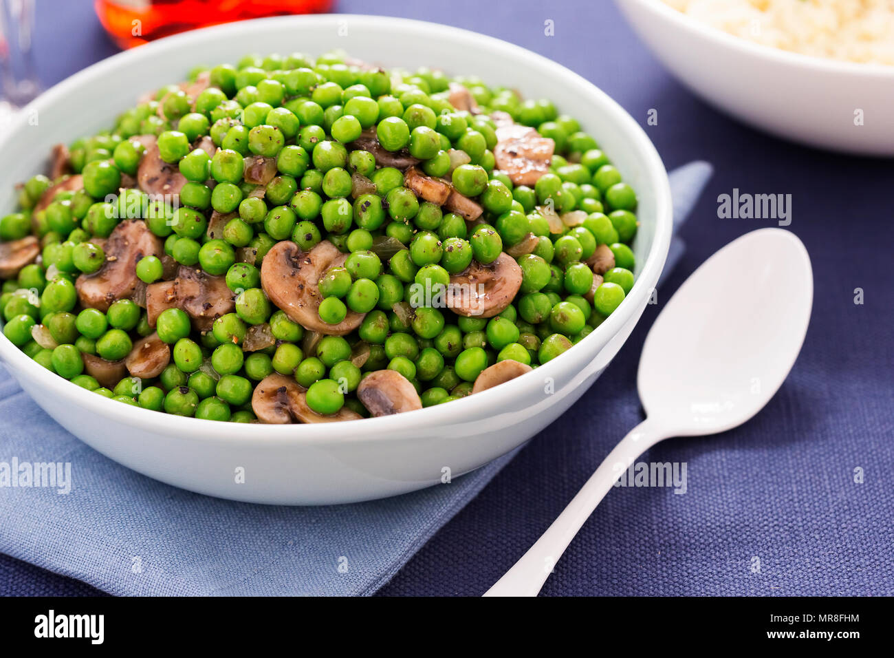 Balsamic peas with mushrooms Stock Photo Alamy