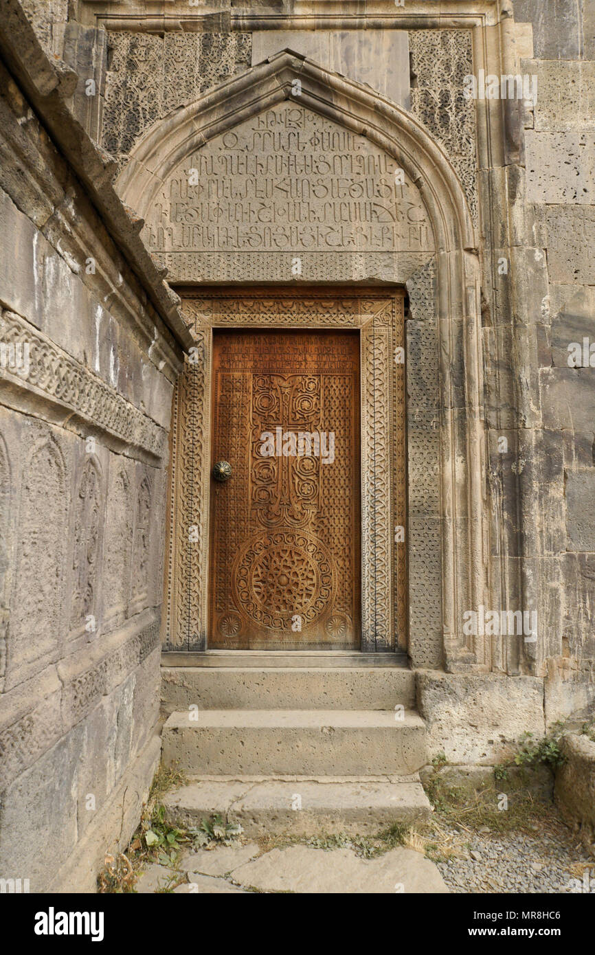 An Intricately Carved Wood Door Leads Into The 9th Century