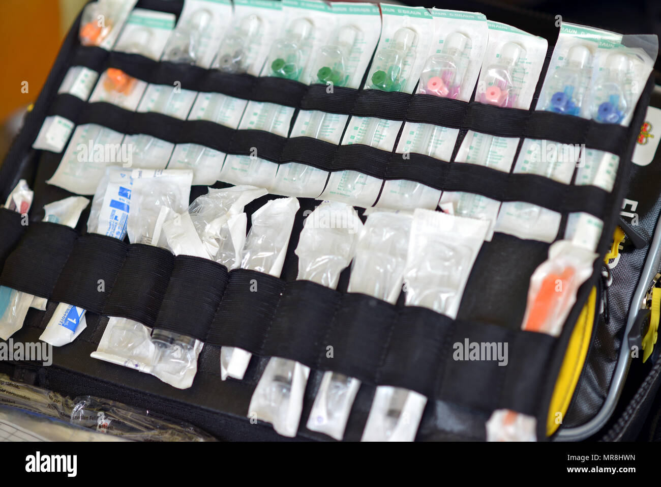 Paramedic's drug administration pack of catheters, needles and syringes