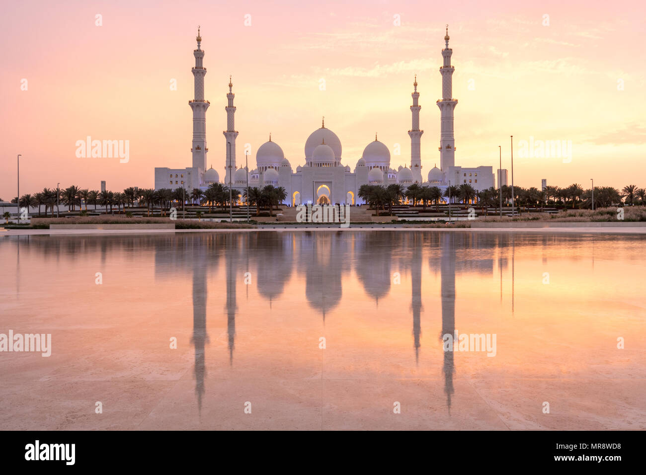 Sunrise at Sheikh Zayed Grand Mosque in Abu Dhabi, capital city of the United Arab Emirates Stock Photo