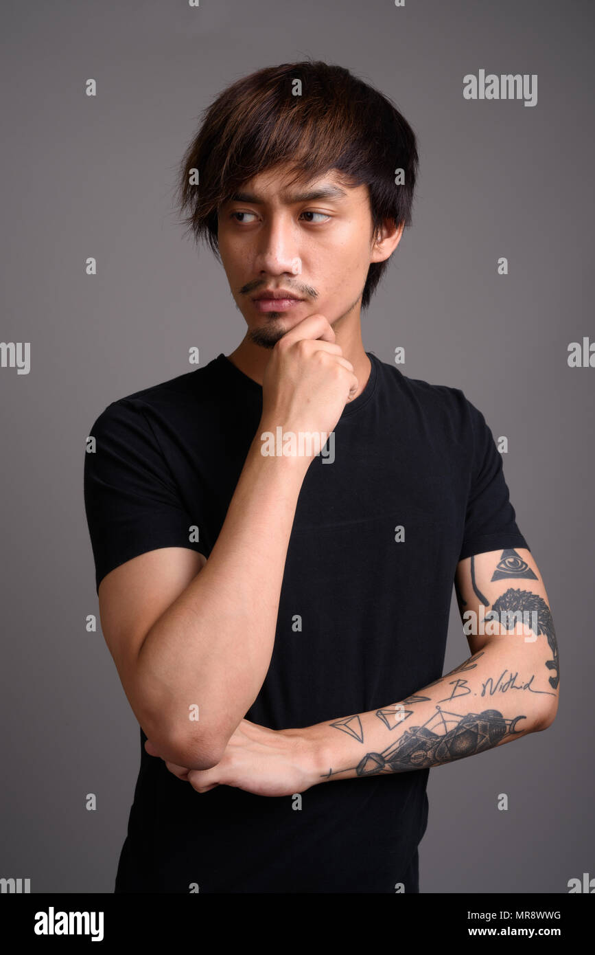 Handsome young asian man hand hi-res stock photography and images - Alamy