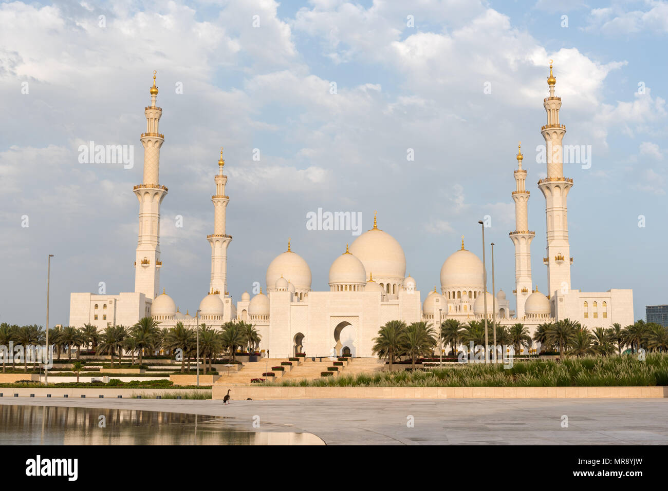 Sunrise on first day of Ramadan 2018 over the Sheikh Zayed Grand Mosque in Abu Dhabi, United Arab Emirates Stock Photo