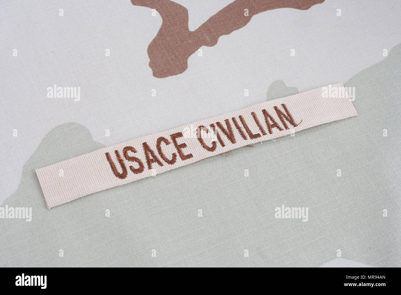KIEV, UKRAINE - June 14, 2015. USACE CIVILAN branch tape on desert camouflage uniform Stock Photo