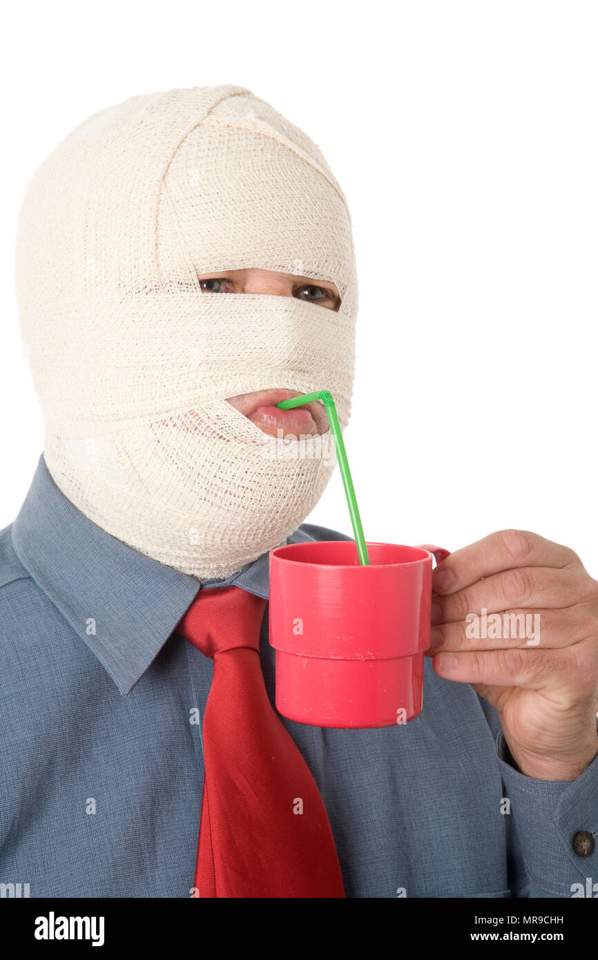 A businessman hindered by bandages, innovation concept. Stock Photo