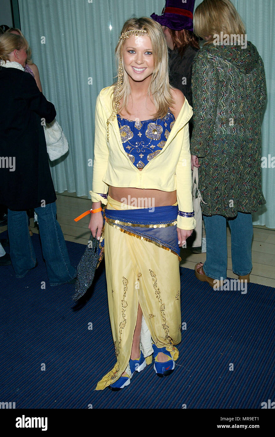 Tara Reid arriving at ' A Halloween 70' Style  ' at the Sky Bar, the Mondrian in Los Angeles. October 31, 2002. ReidTara05A Red Carpet Event, Vertical, USA, Film Industry, Celebrities,  Photography, Bestof, Arts Culture and Entertainment, Topix Celebrities fashion /  Vertical, Best of, Event in Hollywood Life - California,  Red Carpet and backstage, USA, Film Industry, Celebrities,  movie celebrities, TV celebrities, Music celebrities, Photography, Bestof, Arts Culture and Entertainment,  Topix, vertical, one person,, from the year , 2002, inquiry tsuni@Gamma-USA.com Fashion - Full Length Stock Photo