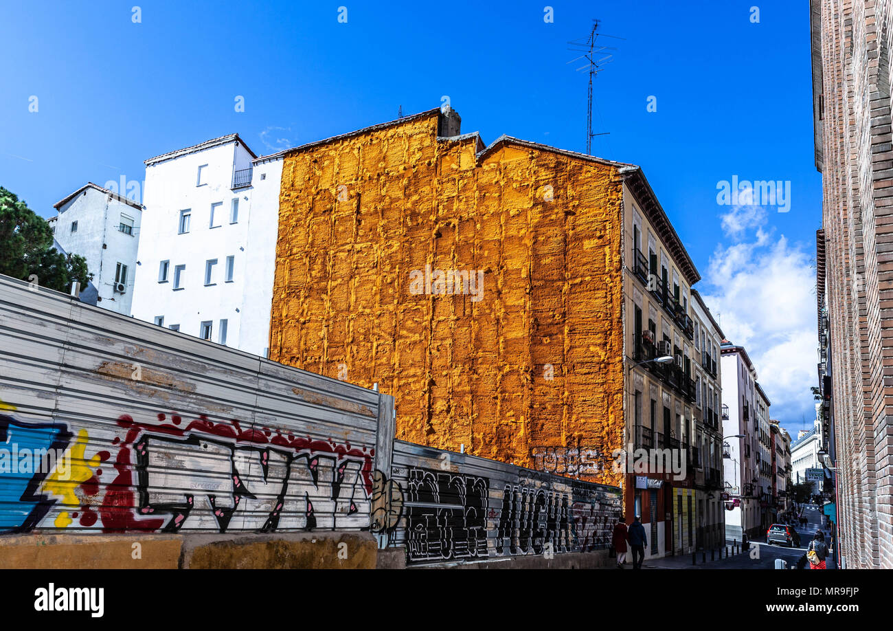 Building side wall covered in orange insulation foam, Madrid, Spain. Stock Photo