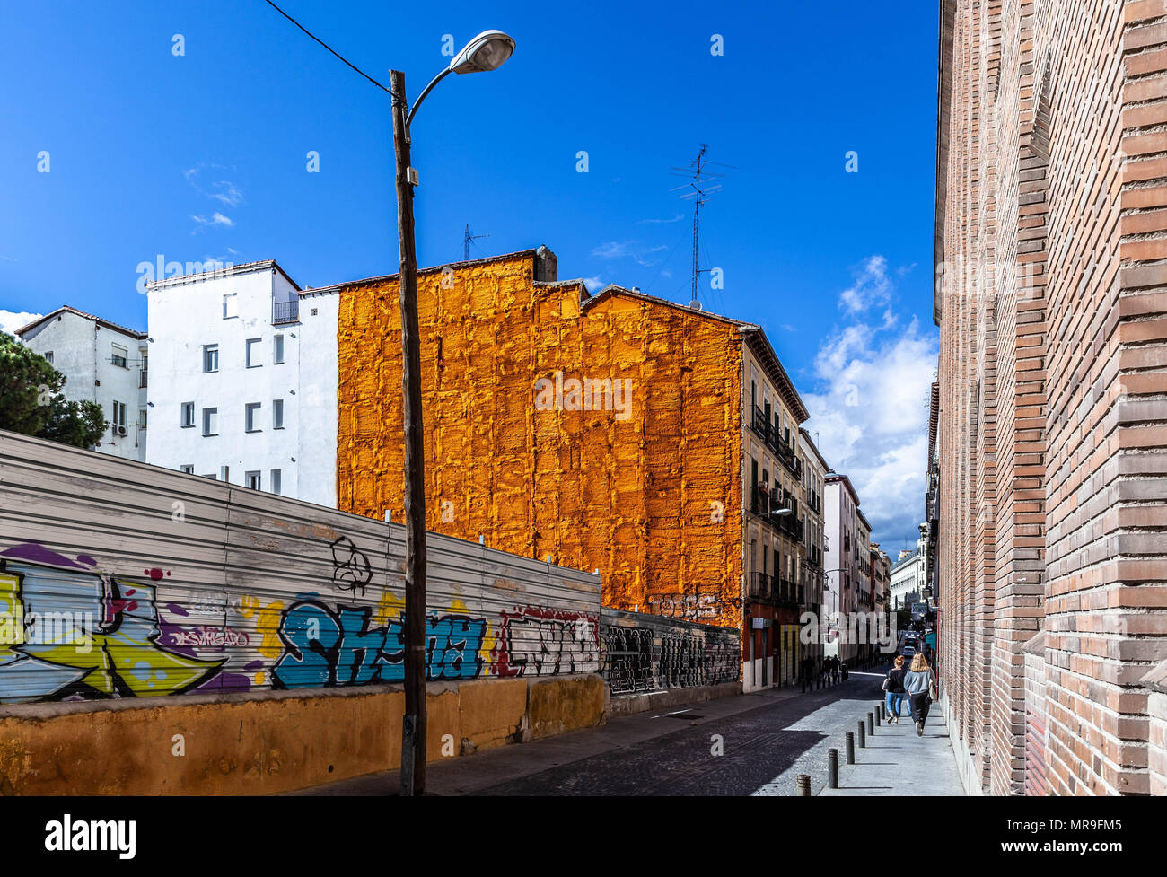 Building side wall covered in orange insulation foam, Madrid, Spain. Stock Photo