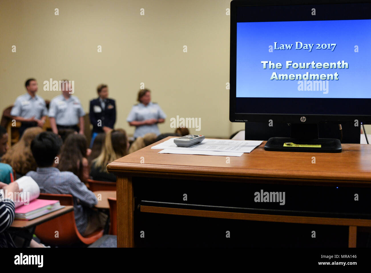 Airmen from the 70th Intelligence, Surveillance and Reconnaissance Wing Judge Advocate office speak to seventh grade students from Magothy River Middle School, Arnold Md., about the 14th Amendment and how military law differs from civilian legal systems during Law Day May 17, 2017. (U.S. Air Force photo/Staff Sgt. Alexandre Montes) Stock Photo