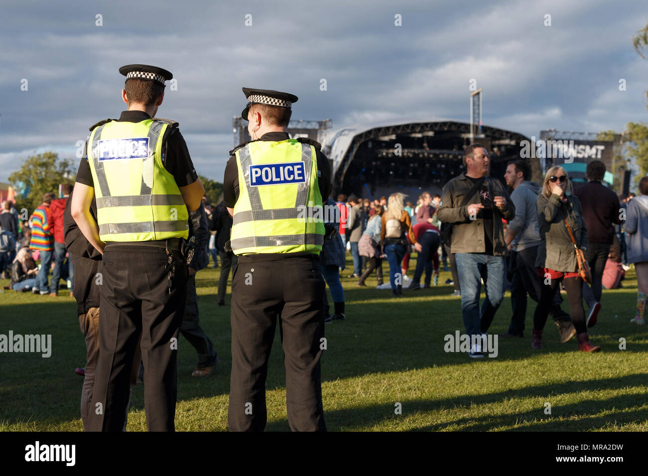 Two police officers at TRNSMT music festival. Glasgow Green, Glasgow, UK. Stock Photo