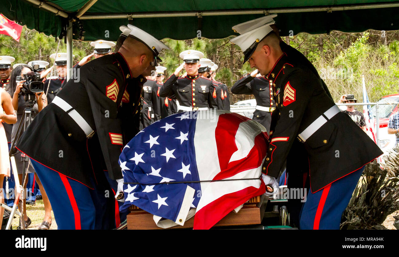 Marines with Marine Corps Logistics Base Albany funeral detail lay the