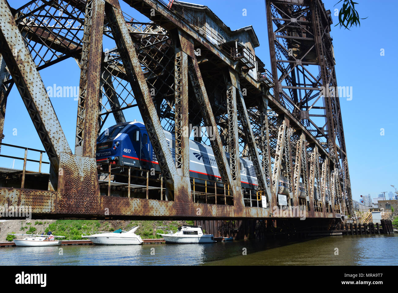 An Amtrack train crosses the Chicago River on the Canal Street railroad lift bridge. Stock Photo