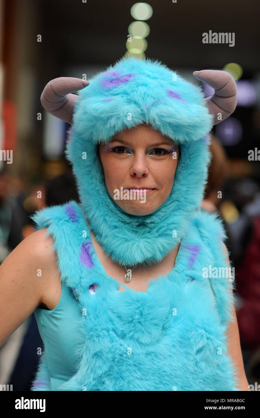 London, UK, 25 May 2018. A cosplay enthusiast dressed as James P. Sullivan ('Sulley') on the opening day of MCM London Comic Con at the ExCel Centre in East London, UK.  Tens of thousands of cosplay enthusiasts  attended the show and more than 130,000 are expected to walk through the doors by the end of the three-day event which finishes on Sunday. Credit: Michael Preston/Alamy Live News Stock Photo