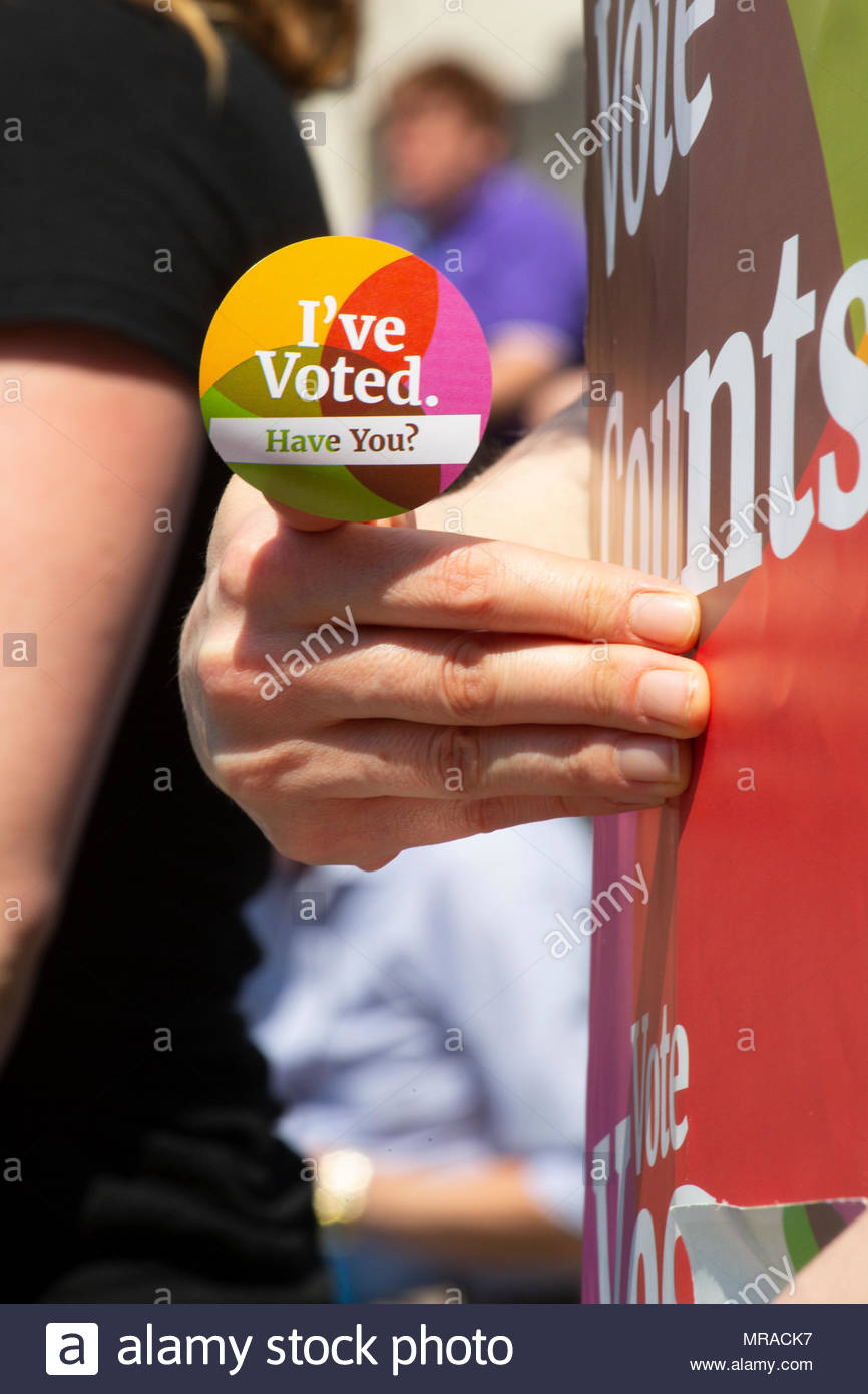 Ennis, County Clare, Ireland, 25 May 2018.  A yes sticker on an activist's thumb in Ennis,Ireland as the referendum draws to a close. A massive Yes result has been predicted by initial exit polls. Credit: reallifephotos/Alamy Live News Stock Photo