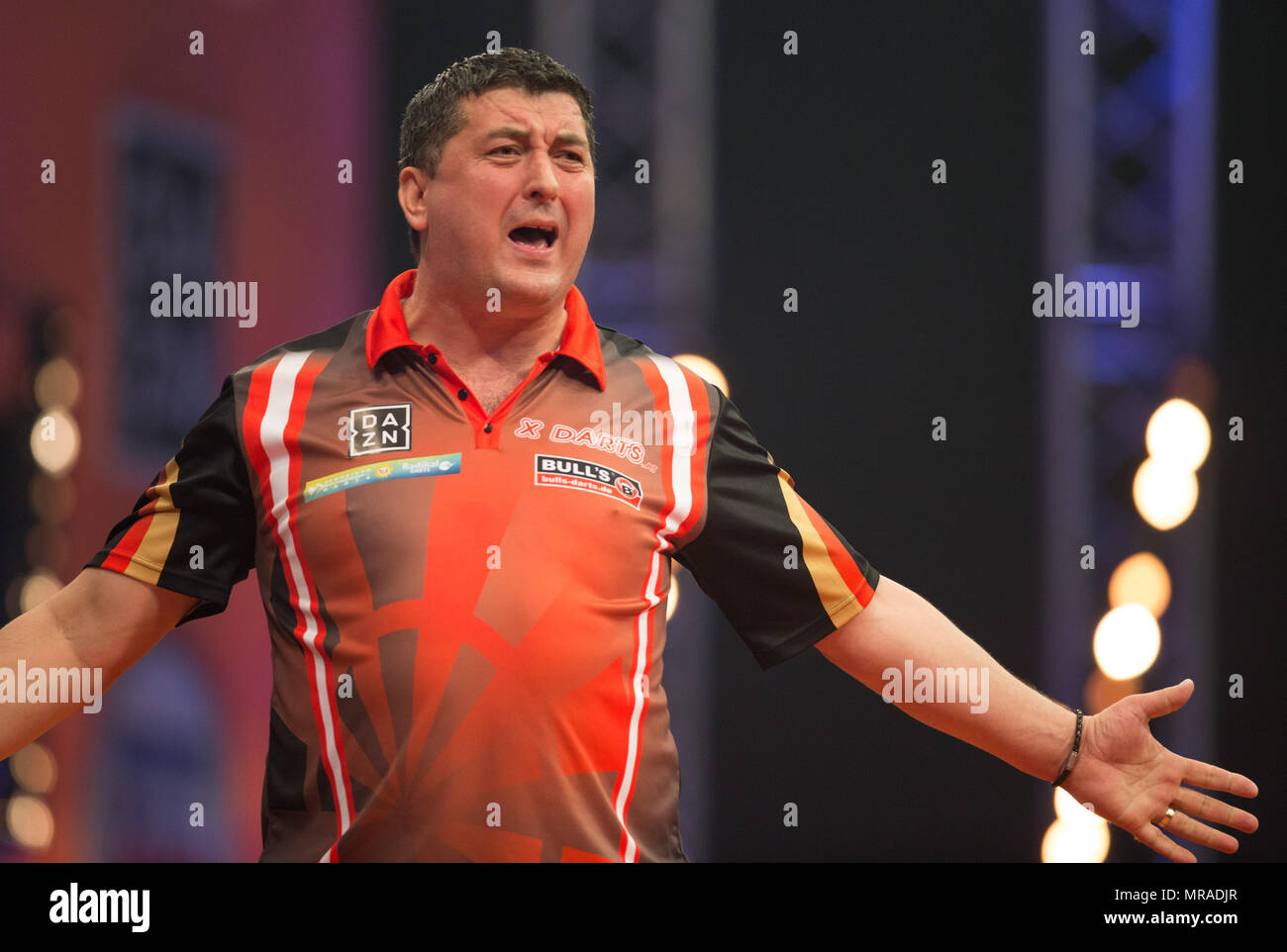 25 May 2018, Germany, Gelsenkirchen: Austrian darts player Mensur Suljovic  in action at the German Darts Masters 2018 of the PDC World Series. Photo:  Friso Gentsch/dpa Stock Photo - Alamy
