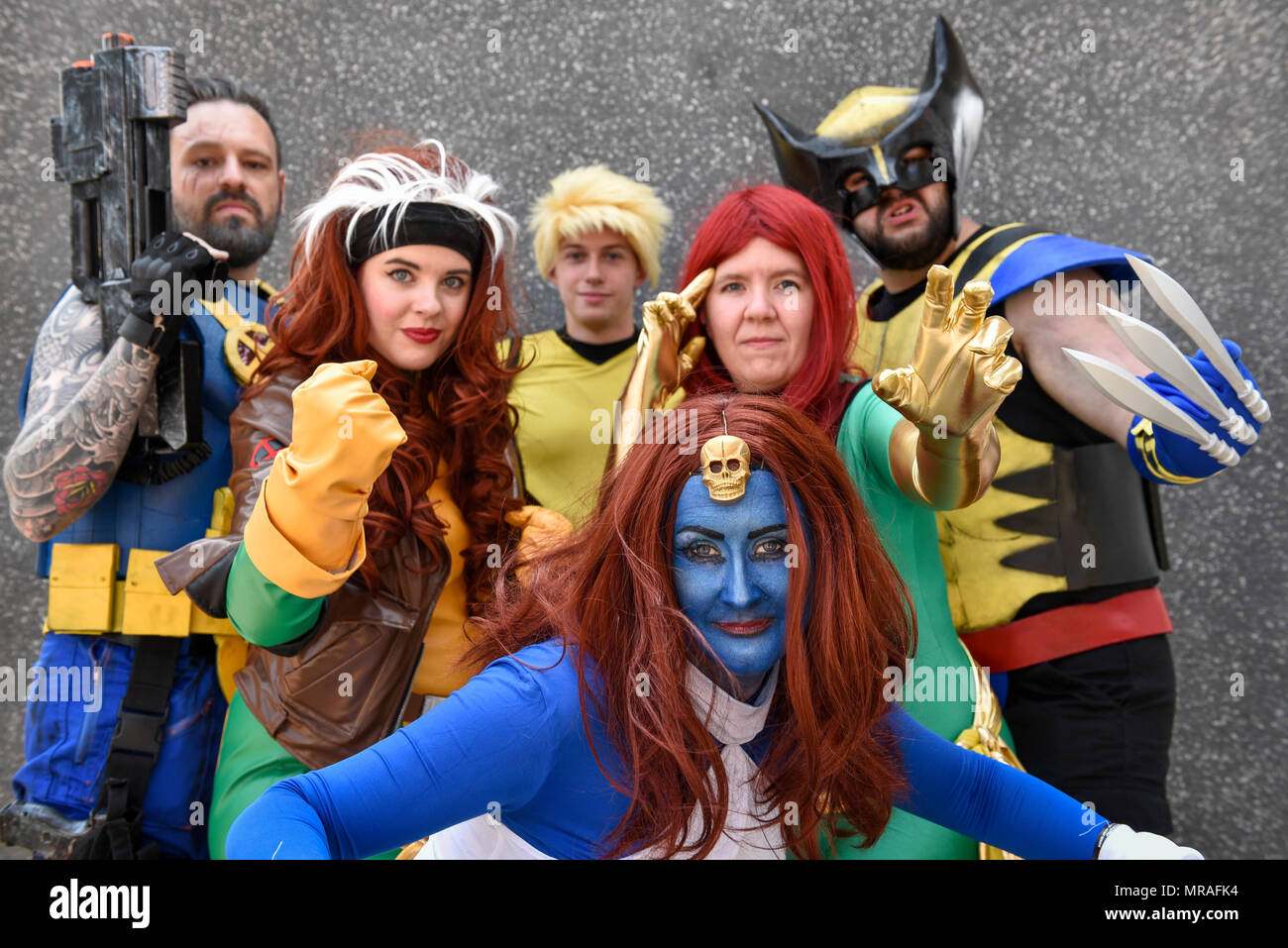 London, UK. 26 May 2018. People dressed as characters from X-Men join  cosplayers attending day two of MCM Comic Con at Excel in East London.  Thousands of fans of video games, comic