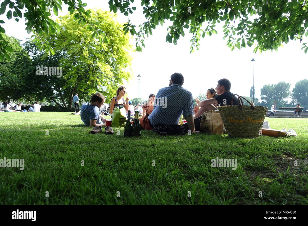 London, UK. 26th May 2018. UK Weather Friends enjoy the good weather