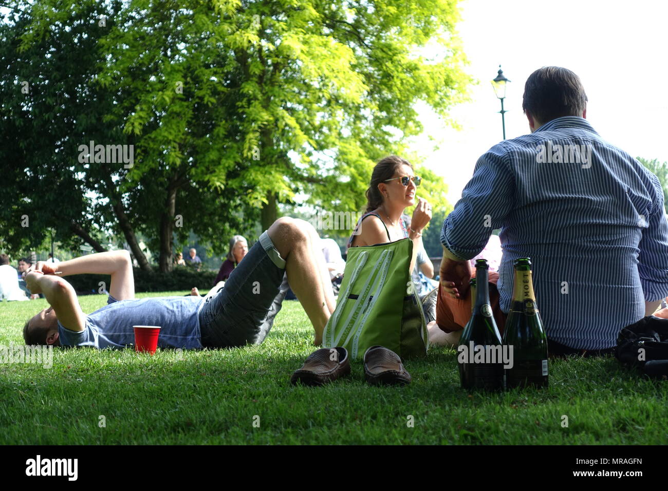 London, UK. 26th May 2018. UK Weather Friends enjoy the good weather