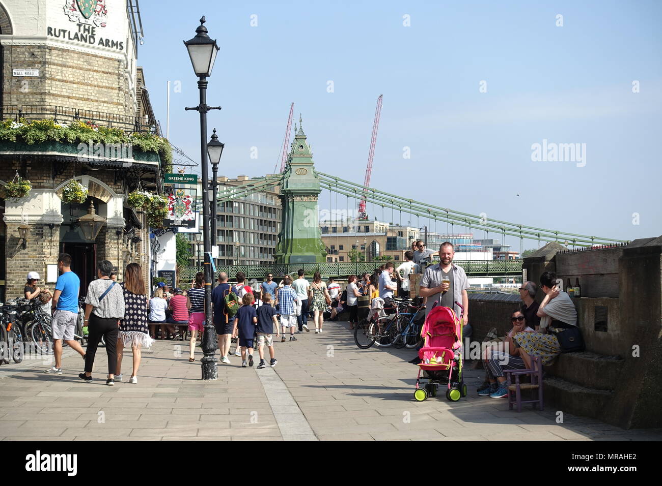 London, UK. 26th May 2018. UK Weather Friends enjoy the good weather