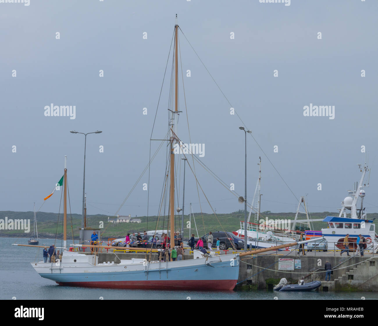 Baltimore, Ireland 26th May, 2018. Wooden boats of all shapes and sizes gather for the Wooden Boat Festival this weekend, with boats under sail racing, a boat building competition, a spectacular parade of sail boats, plus many other attractions, all in conjunction with the Baltimore Sea Food Festival. Credit: aphperspective/Alamy Live News Stock Photo