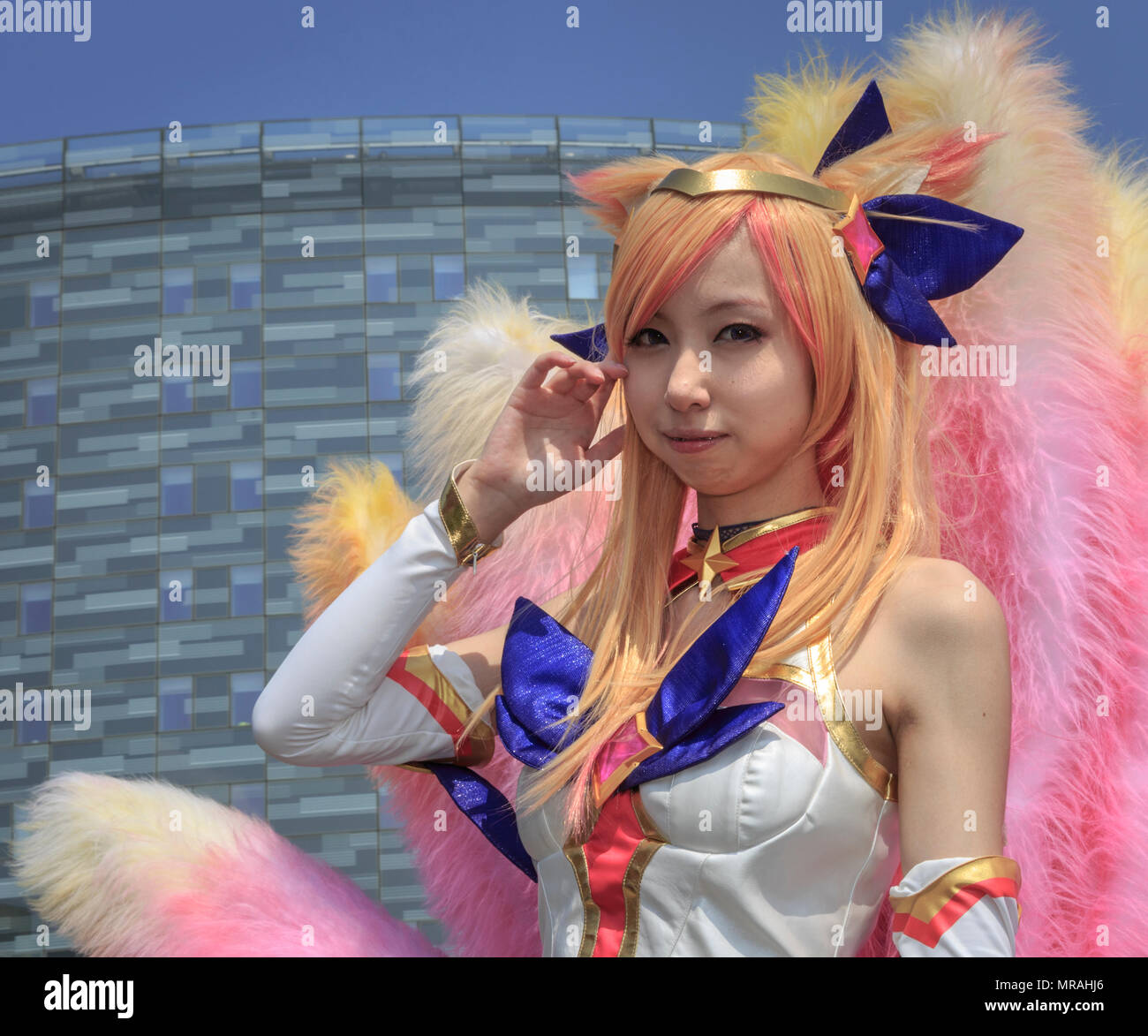 ExCel, London, 26th May 2018. A female cosplayer poses as star guardian Ahri from League of Legends. Cosplayers, Comic Characters, superheros and costumed visitors come together for MCM Comicon 2018 on the second day, a busy Saturday, running at ExCel Exhibition Centre May 25-27th. Credit: Imageplotter News and Sports/Alamy Live News Stock Photo