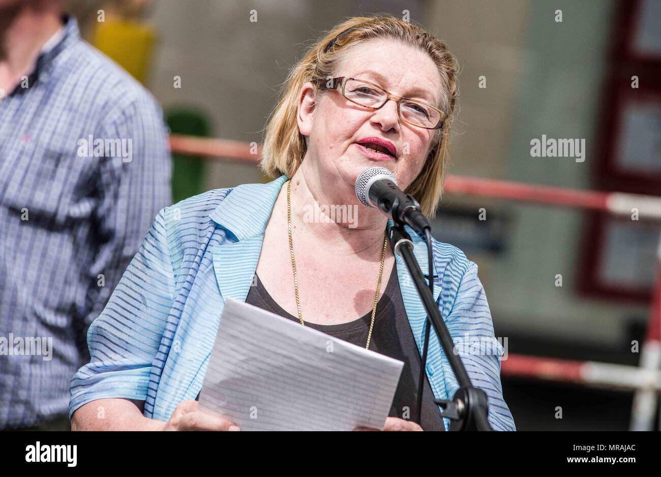Munich, Bavaria, Germany. 26th May, 2018. Renate Werlberger. Held by party member Renate Werlberger, the neo nazi NPD (National Demokratische Partei) party held a rally in the Munich city center in order to expose themselves to potentially thousands of passers-by and tourists. Frank Auterhoff was invited from Franken as speaker. One participant had criminal charges filed by police for allegedly giving a three-finger neo nazi sign. Credit: Sachelle Babbar/ZUMA Wire/Alamy Live News Stock Photo