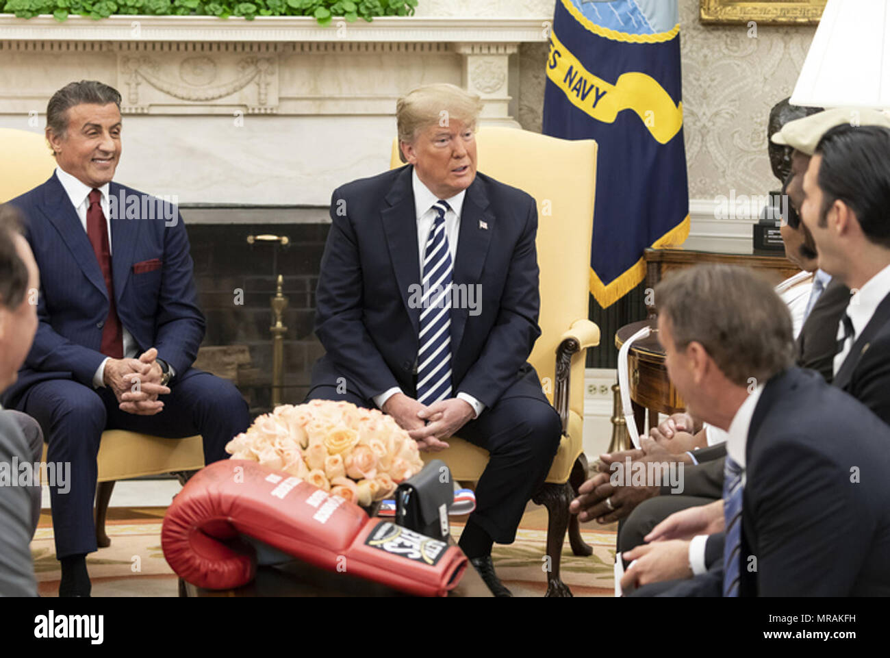 washington-dc-week-of-may-21-president-donald-j-trump-joined-by-actor-sylvester-stallone-left-and-three-time-champion-boxer-lennox-lewis-meets-with-members-of-the-world-boxing-council-and-linda-haywood-the-niece-of-boxer-jack-johnson-the-first-african-american-heavyweight-champion-thursday-may-24-2018-prior-to-signing-a-posthumous-pardon-for-johnson-in-the-oval-office-of-the-white-house-in-washington-dc-people-president-donald-trump-sylvester-stallone-MRAKFH.jpg