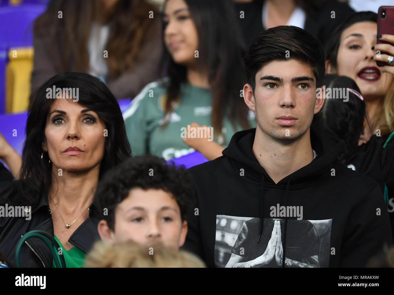 Kiev, Ukraine, 26 May 2018, soccer, Champions League, Real Madrid vs FC Liverpool, finals at the Olimpiyskiy National Sports Complex. The wife of Real Madrid's coach Zinedine Zidane, Veronique Zidane, and their son Theo Zidane sitting among the audience before the match. Photo: Ina Fassbender/dpa Credit: dpa picture alliance/Alamy Live News Credit: dpa picture alliance/Alamy Live News Credit: dpa picture alliance/Alamy Live News Stock Photo