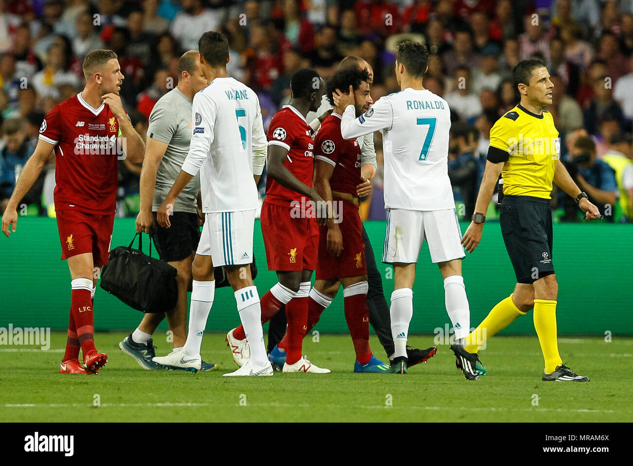 Kiev, Ukraine, 26 May 2018. Cristiano Ronaldo of Real Madrid consoles  Mohamed Salah of Liverpool as he is substituted during the UEFA Champions  League Final match between Real Madrid and Liverpool at