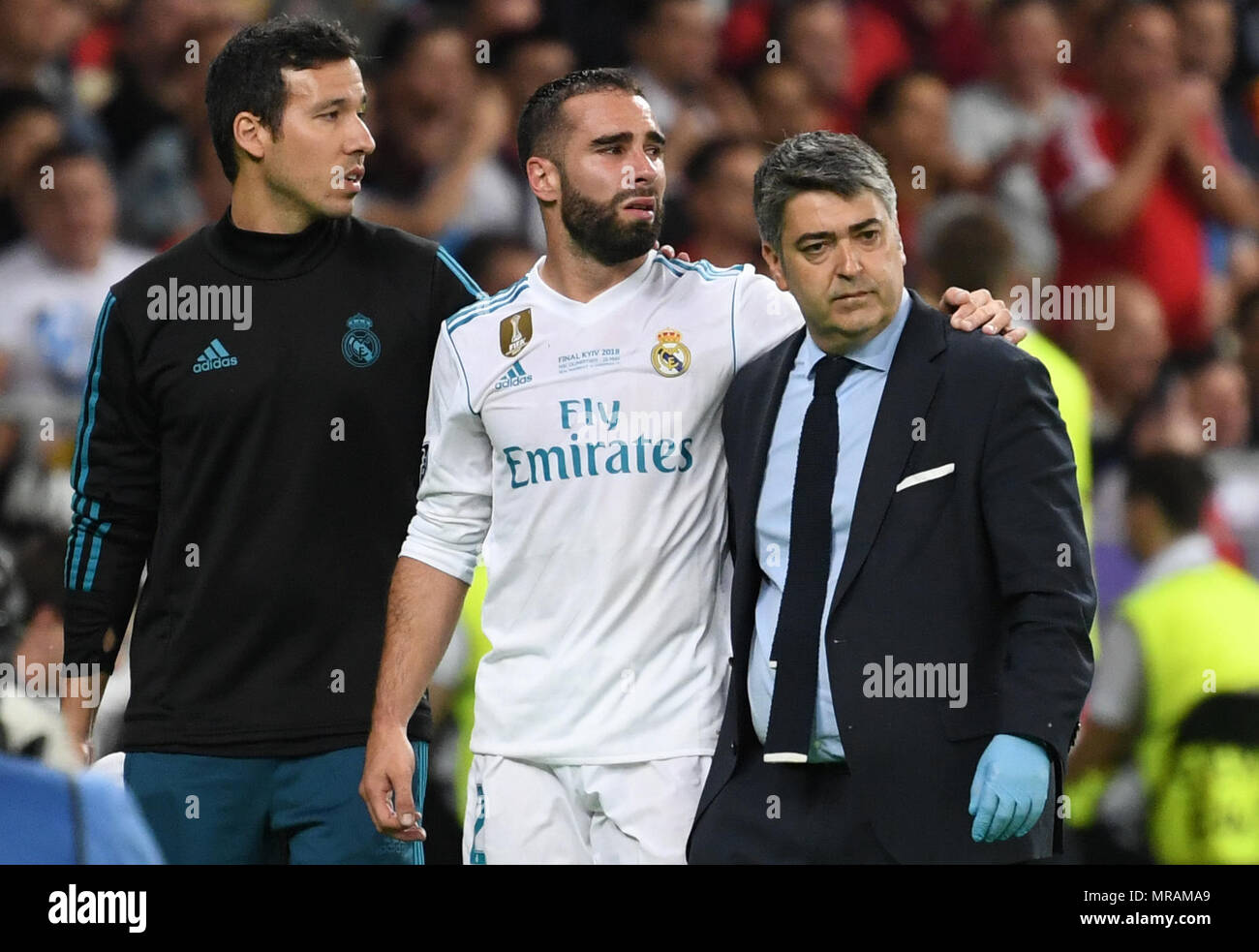 26 May 2018, Ukraine, Kiev: soccer, Champions League, Real Madrid vs FC Liverpool, finals at the Olimpiyskiy National Sports Complex. Madrid's Dani Carvajal leaves the field due to an injury. Photo: Ina Fassbender/dpa Credit: dpa picture alliance/Alamy Live News Stock Photo