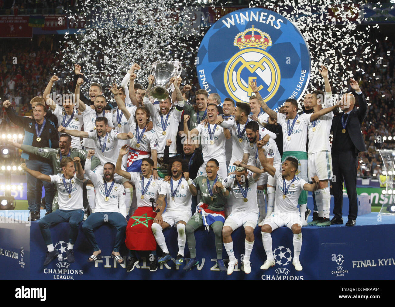 Kiev, Ukraine. 26th May, 2018. Real Madrid players celebrate with the trophy after winning the UEFA Champions League final soccer match Real Madrid vs Liverpool FC, at the NSC Olimpiyskiy stadium in Kiev on 26 May 2018. Credit: Serg Glovny/ZUMA Wire/Alamy Live News Stock Photo