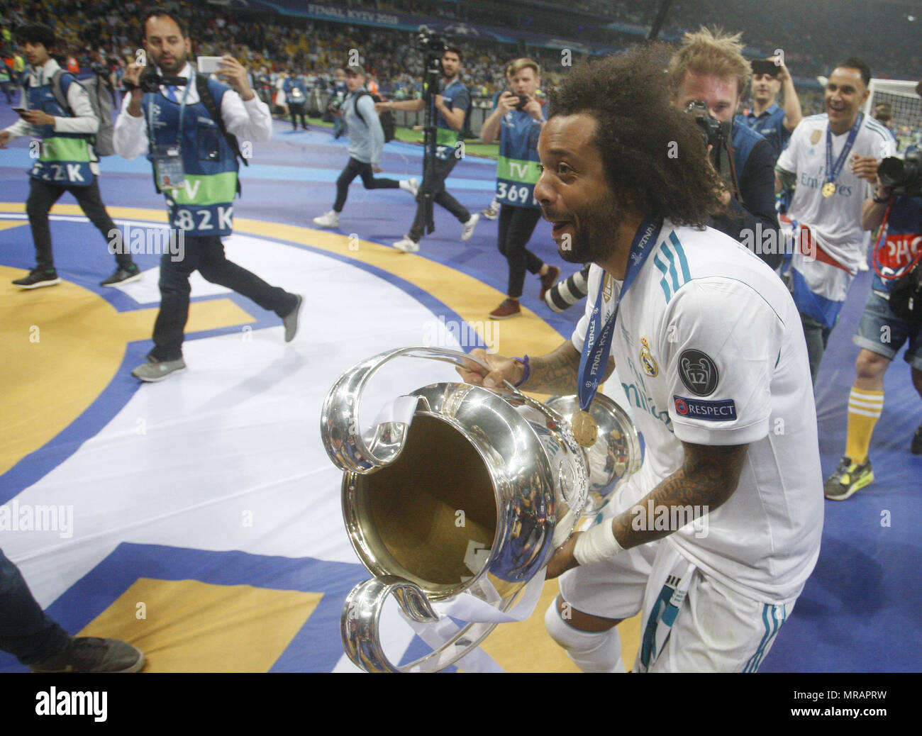 Kiev, Ukraine. 27th May, 2018. Real Madrid's MARCELO celebrates with the trophy after winning the UEFA Champions League final soccer match Real Madrid vs Liverpool FC, at the NSC Olimpiyskiy stadium in Kiev on 26 May 2018. Credit: Serg Glovny/ZUMA Wire/Alamy Live News Stock Photo