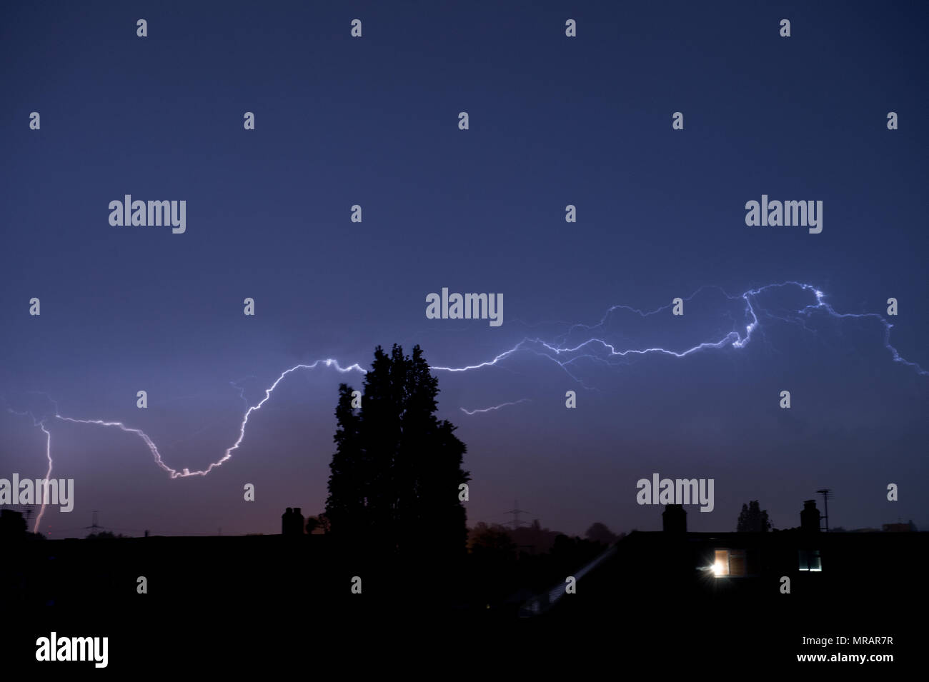 Wimbledon, London, UK. 27 May, 2018. Continuous lightning combined with torrential rain hits London from late on 26 May through to early hours of 27 May 2018. Credit: Malcolm Park/Alamy Live News. Stock Photo
