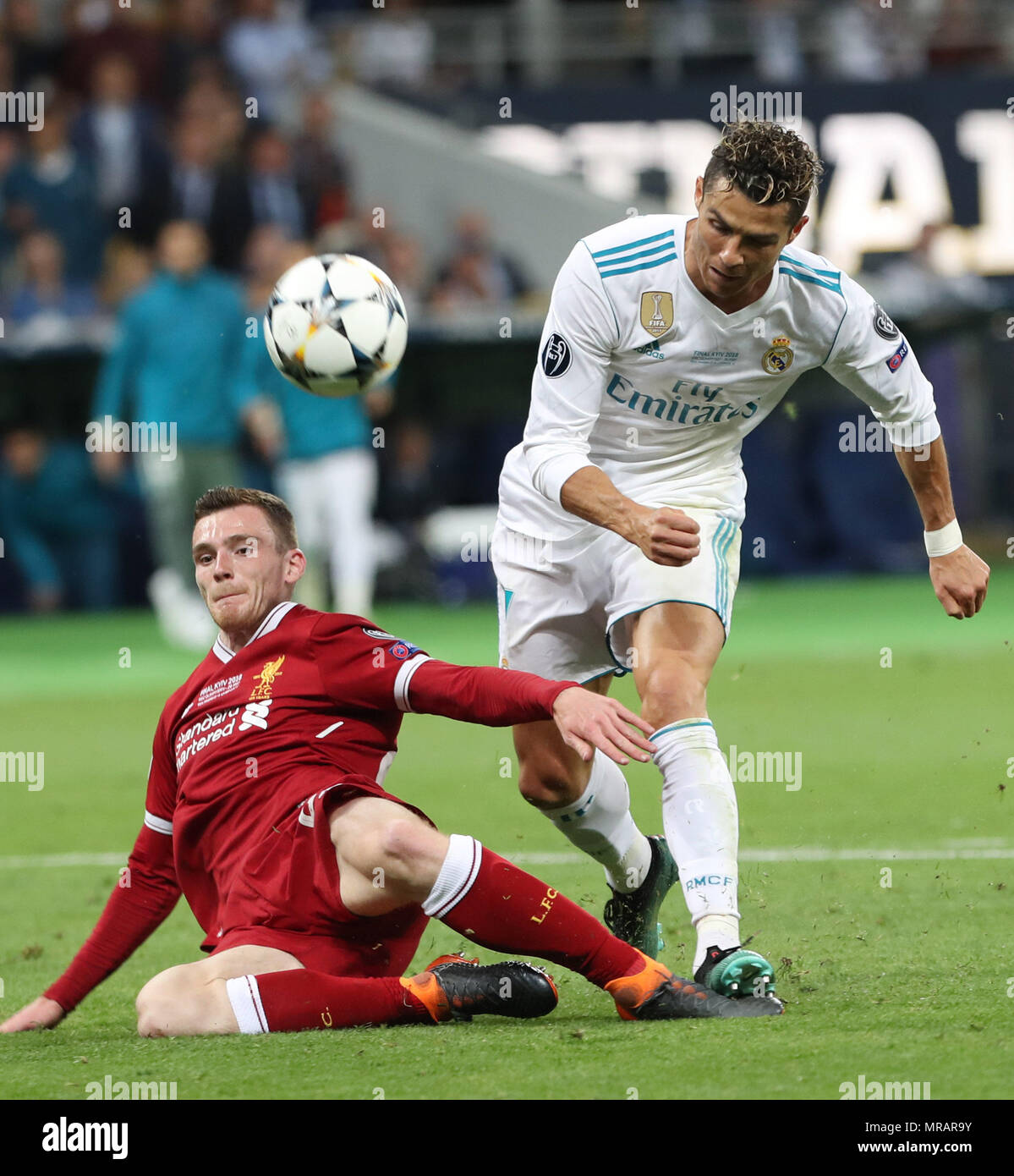 Kiev, Ukraine. 22nd Mar, 2018. Real Madrid's CRISTIANO RONALDO (R) fight for the ball with Liverpool's ANDY ROBERTSON (L), during the UEFA Champions League final soccer match Real Madrid vs Liverpool FC, at the NSC Olimpiyskiy stadium in Kiev on 26 May 2018. Credit: Serg Glovny/ZUMA Wire/Alamy Live News Stock Photo